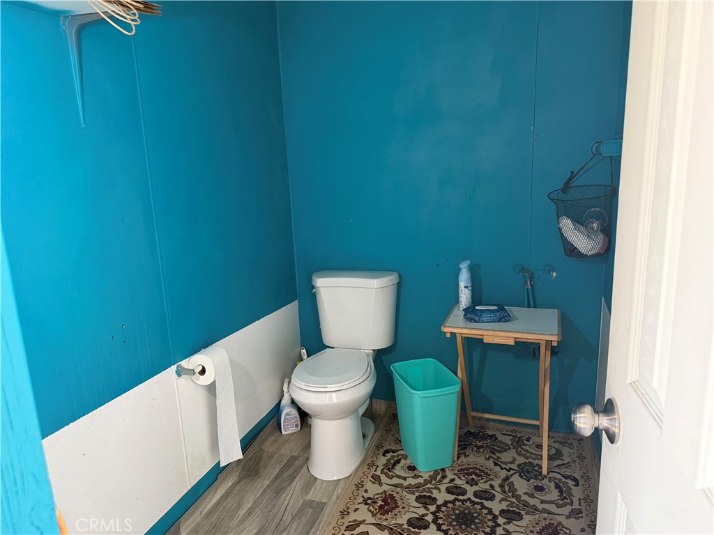 35030 Harvard Road Newberry Springs, CA 92365 - Photo 13 of 23 a bathroom with a toilet and a sink