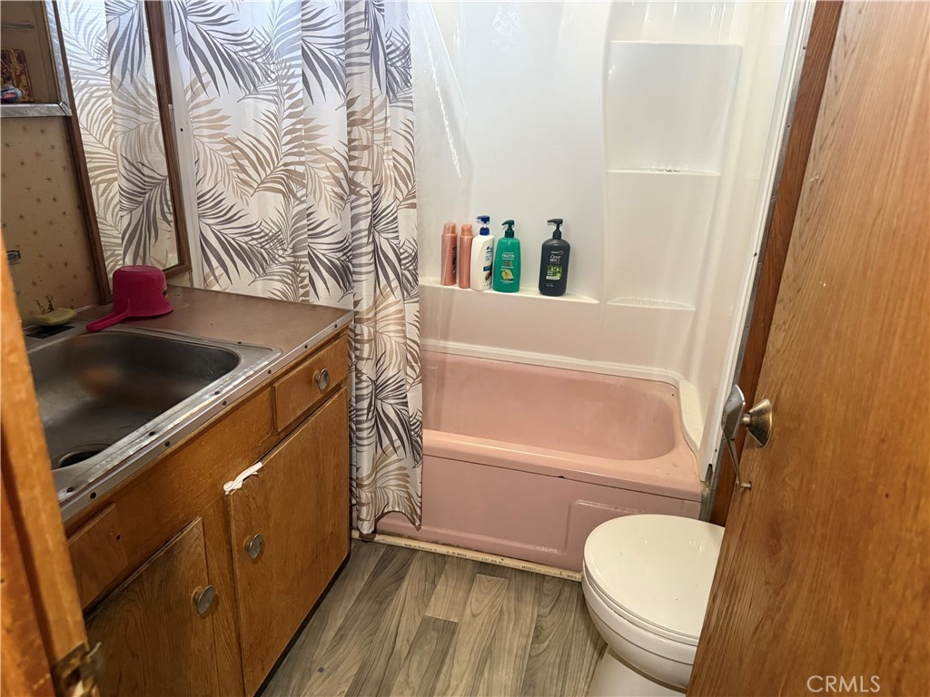 35030 Harvard Road Newberry Springs, CA 92365 - Photo 14 of 23 a bathroom with a granite countertop sink toilet and shower