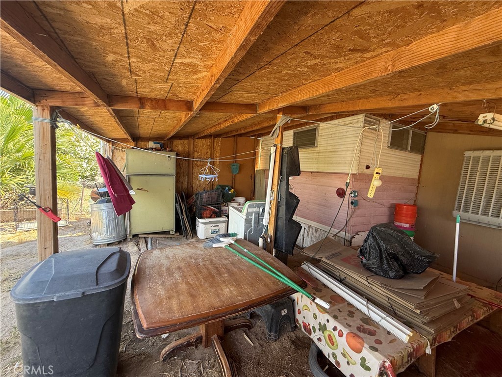 35030 Harvard Road Newberry Springs, CA 92365 - Photo 10 of 23 a room with furniture and wooden floor