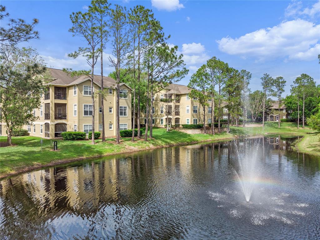 413 Summit Ridge Place, Unit 303 Longwood, FL 32779 - Photo 1 of 1 Corner Unit with a Pond View
