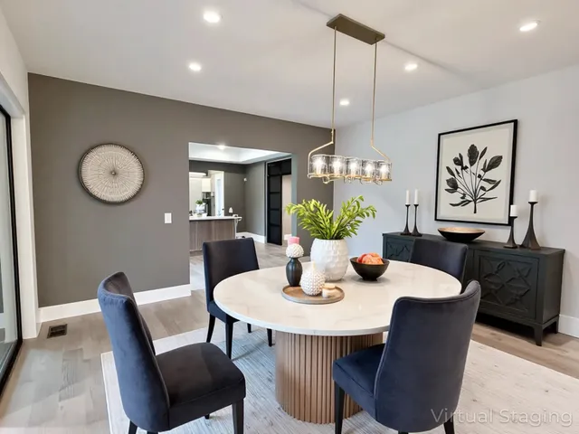 a kitchen with granite countertop a stove and white cabinets