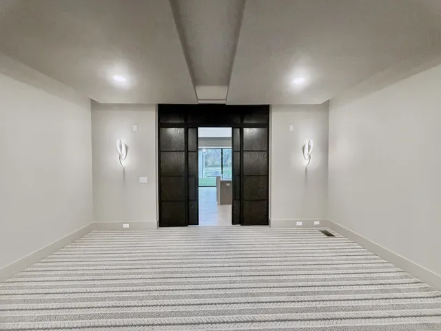 a living room with fireplace furniture and a flat screen tv