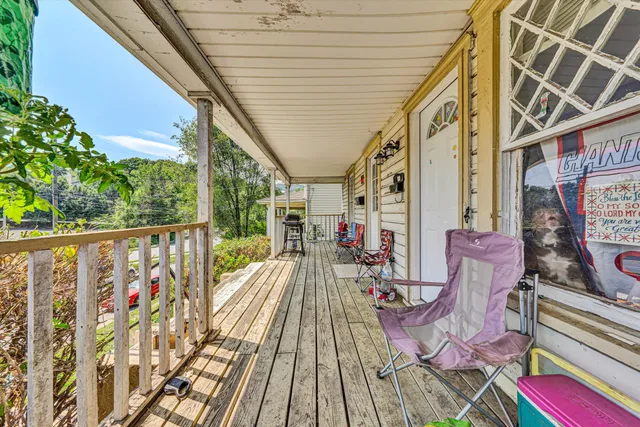 a balcony view with furniture