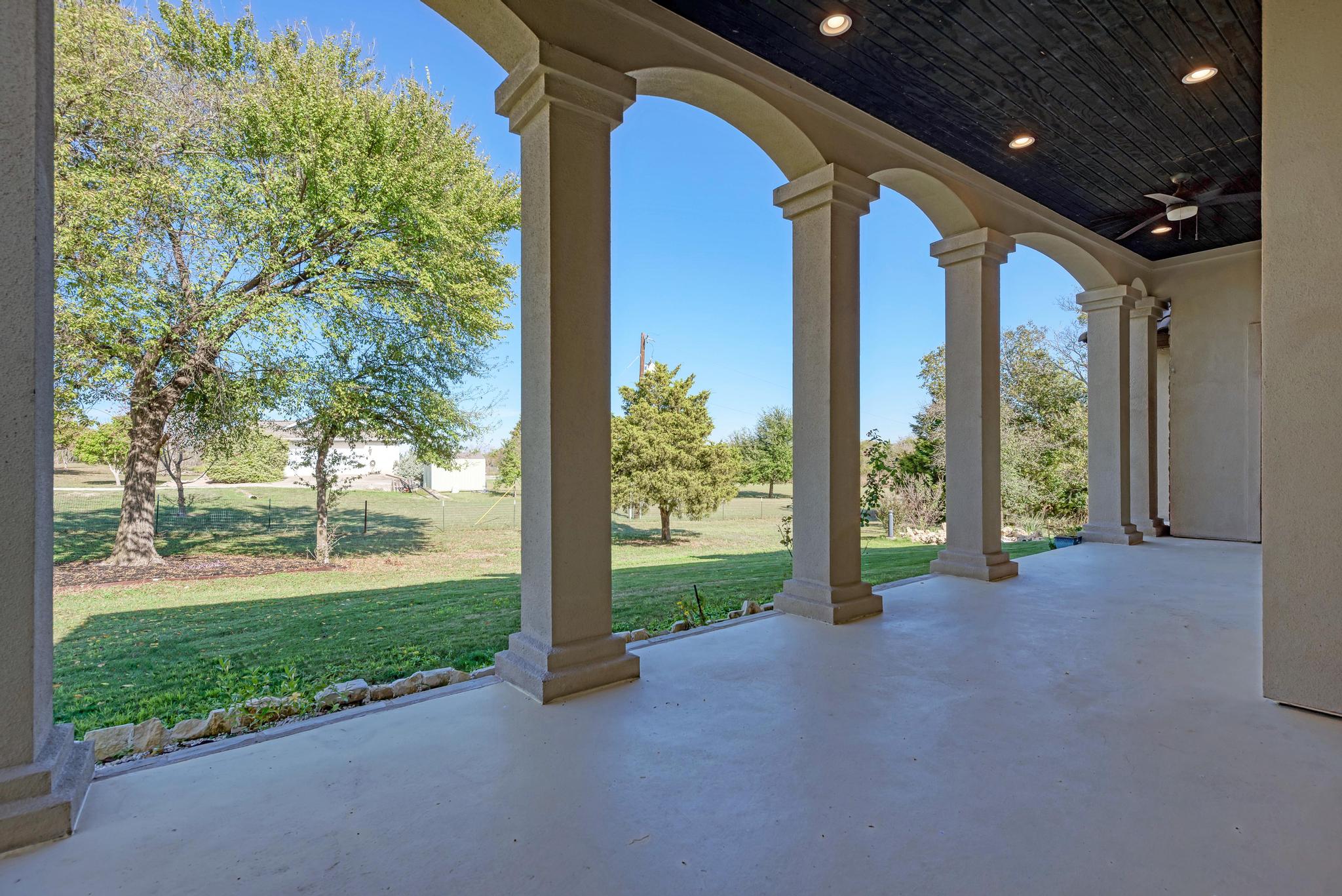 104 Spring Valley Street Hutto, TX 78634 - Photo 32 of 40 View of patio / terrace featuring a ceiling fan