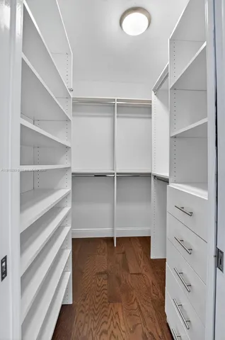 a view of an empty walk in closet