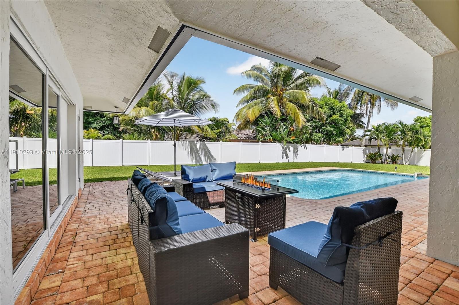 5660 Golfway Drive Boca Raton, FL 33433 - Photo 30 of 41 swimming pool view with a seating space