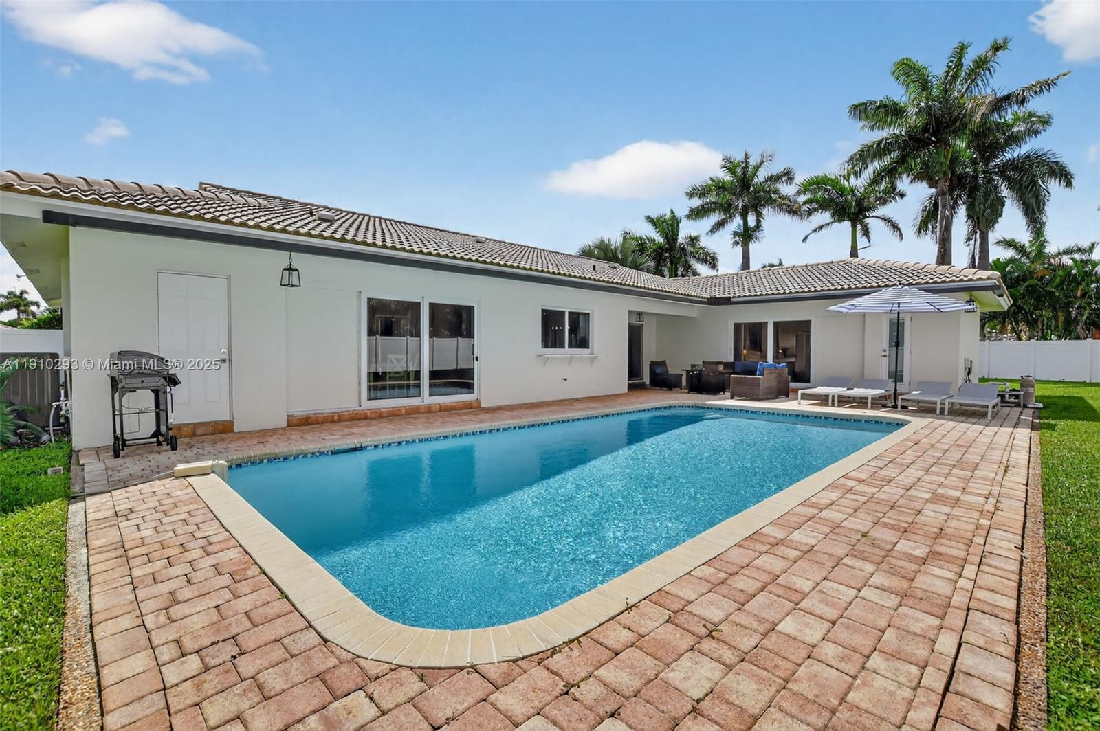 5660 Golfway Drive Boca Raton, FL 33433 - Photo 34 of 41 a view of a house with a swimming pool