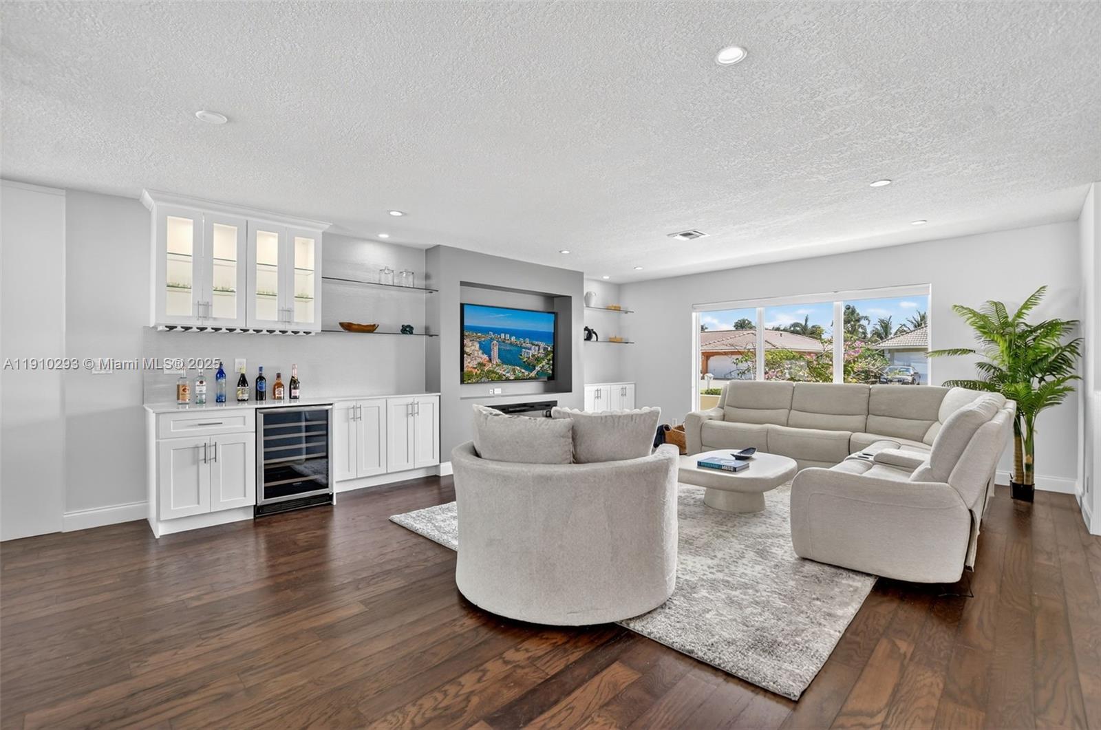 5660 Golfway Drive Boca Raton, FL 33433 - Photo 7 of 41 a living room with furniture and a wooden floor
