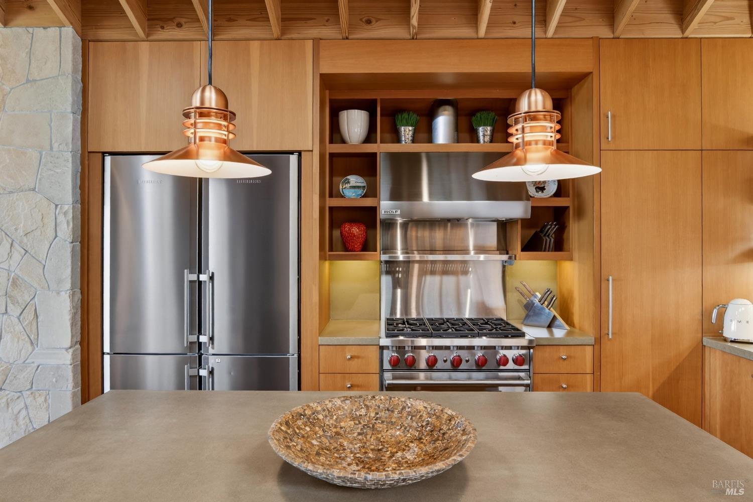 233 Solstice The Sea Ranch, CA 95497 - Photo 23 of 90 Chef's kitchen with Liebherr refrigerator and six-burner Wolf range with hood