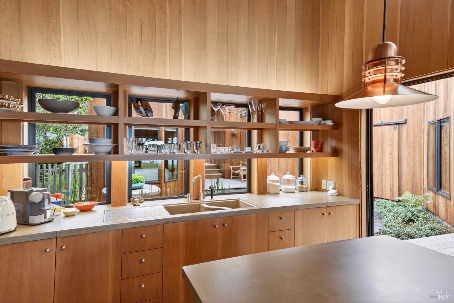233 Solstice The Sea Ranch, CA 95497 - Photo 27 of 90 Open shelving over concrete sink/counter