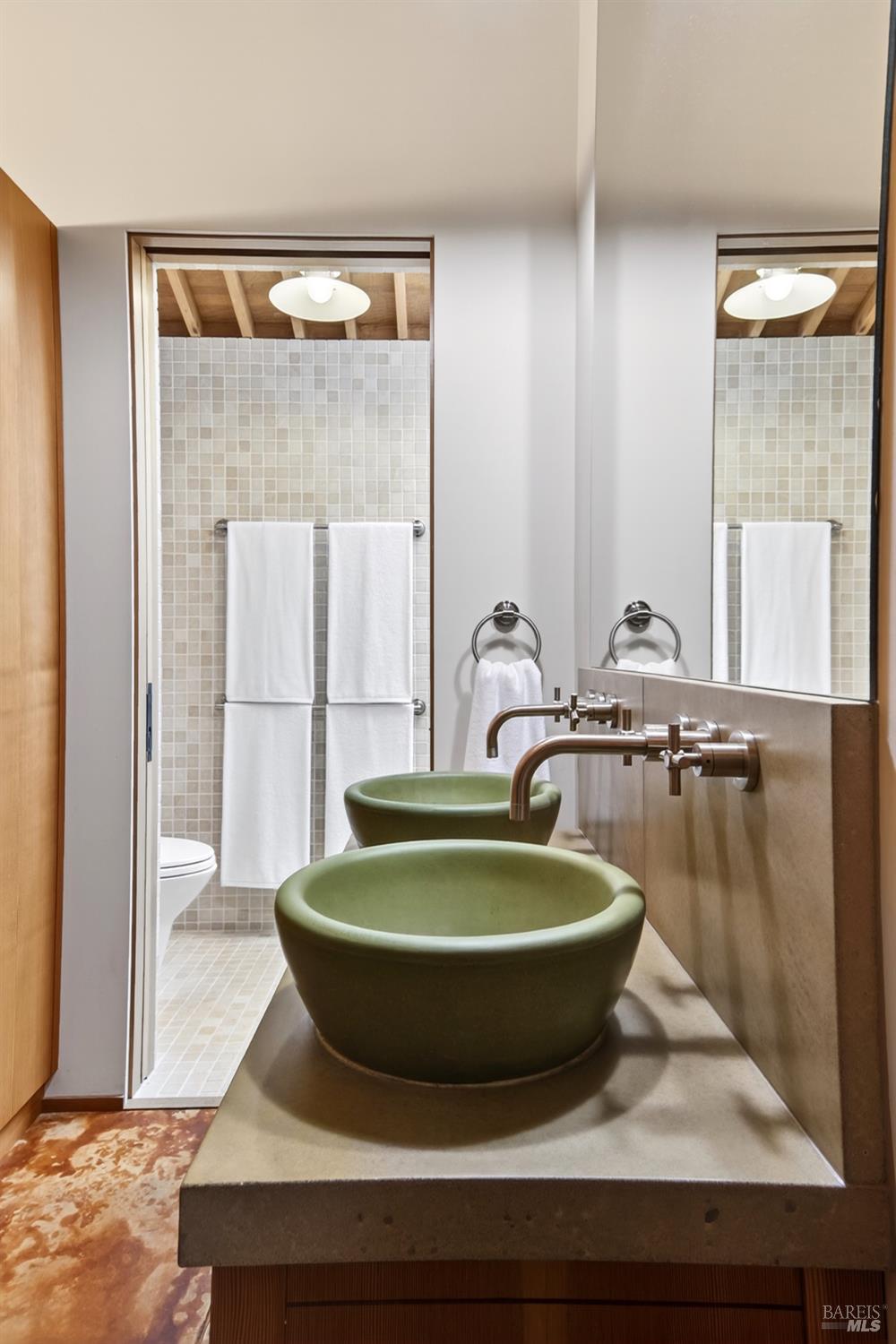 233 Solstice The Sea Ranch, CA 95497 - Photo 33 of 90 Dual concrete basins on concrete counter adjoin primary bathroom