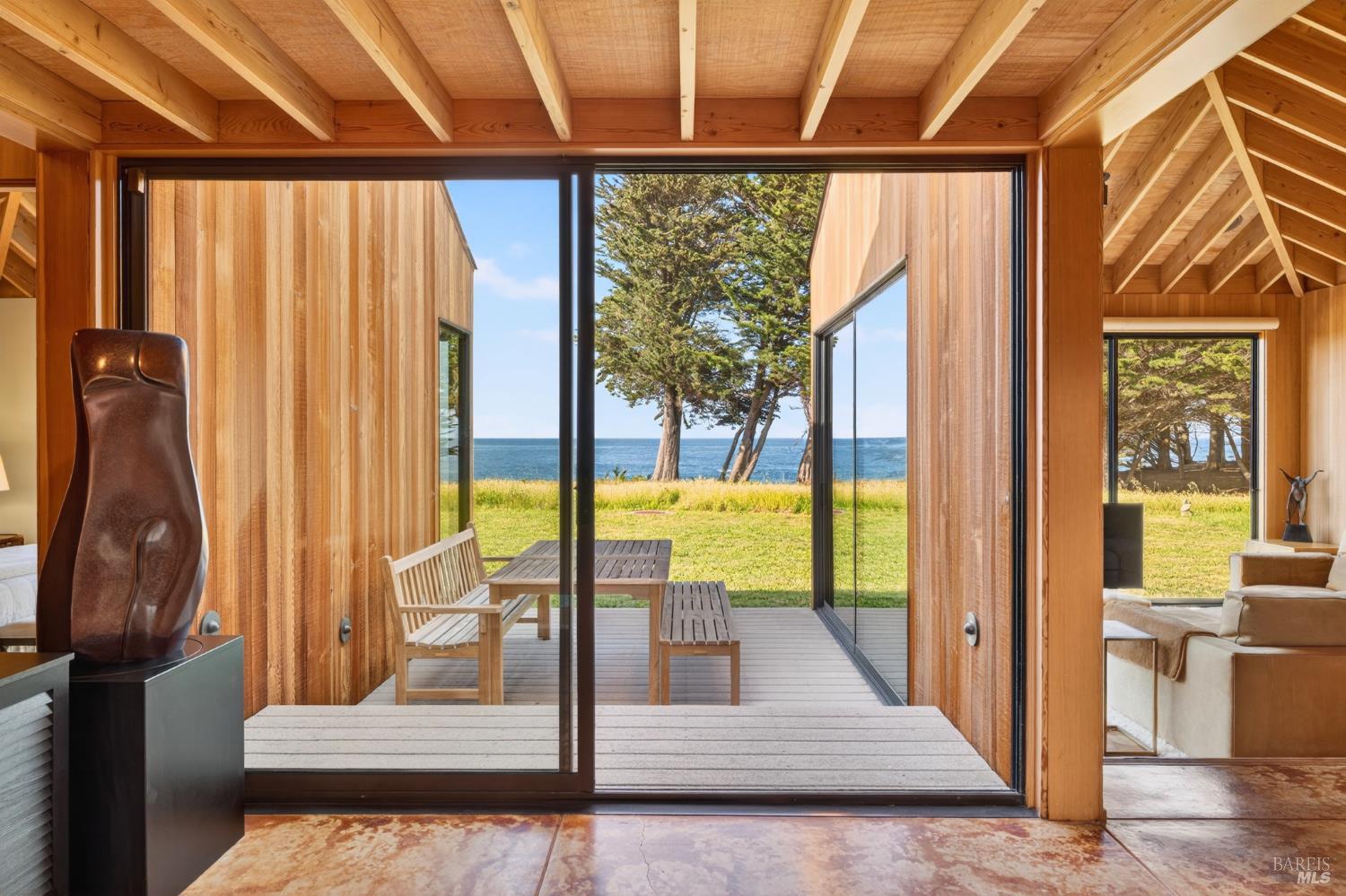 233 Solstice The Sea Ranch, CA 95497 - Photo 4 of 90 Front entry with uninterrupted ocean view that blends seamlessly into a neutral palette reflecting generous natural light throughout