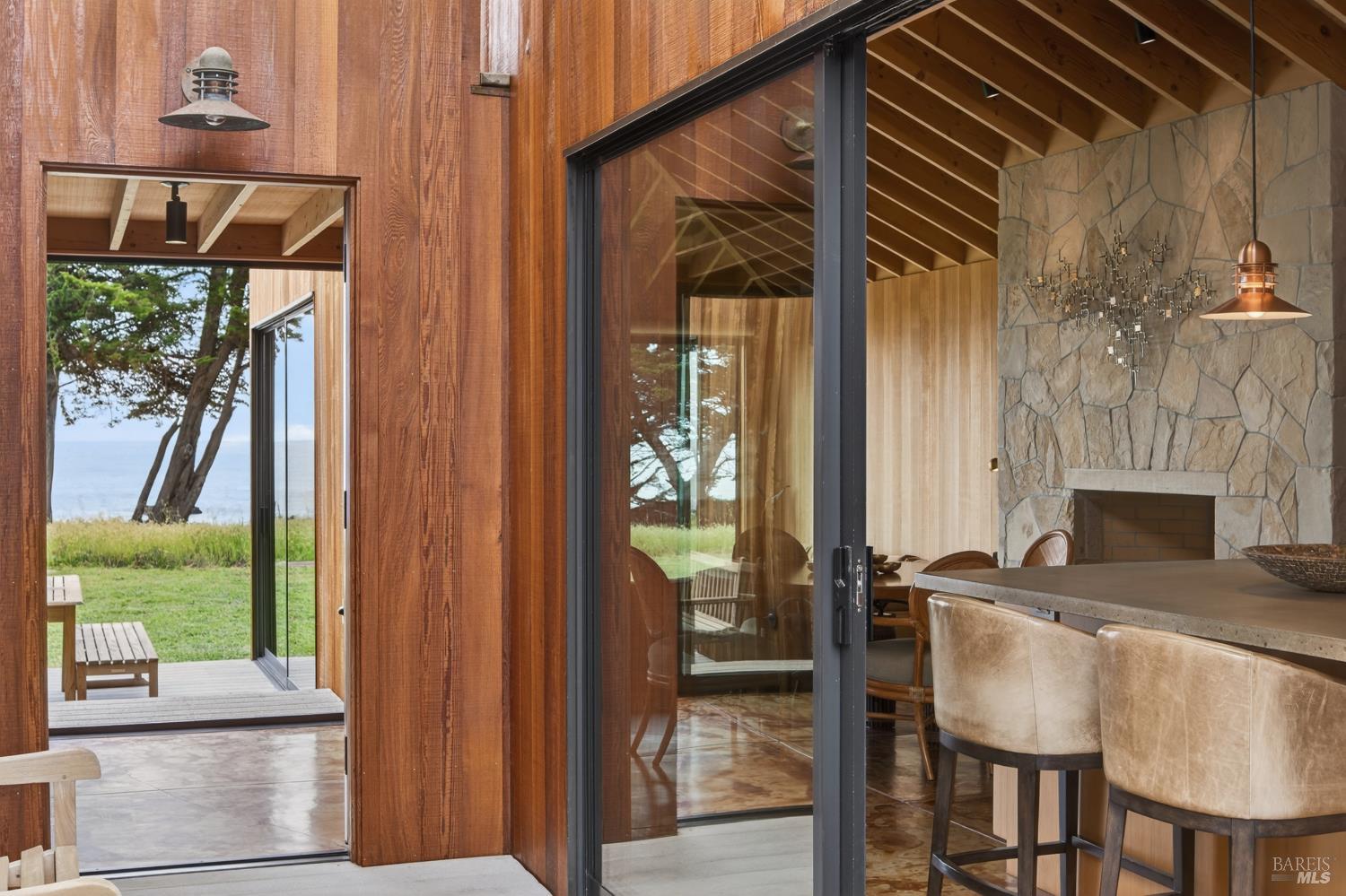 233 Solstice The Sea Ranch, CA 95497 - Photo 42 of 90 Entry from courtyard open to foyer through front door and kitchen through glass sliding doors