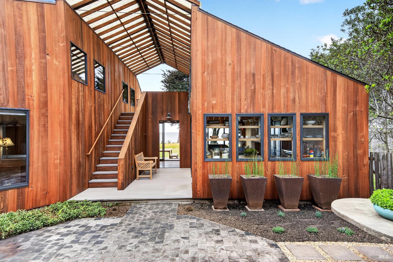 233 Solstice The Sea Ranch, CA 95497 - Photo 49 of 90 Courtyard with covering and steps to upper view look out deck