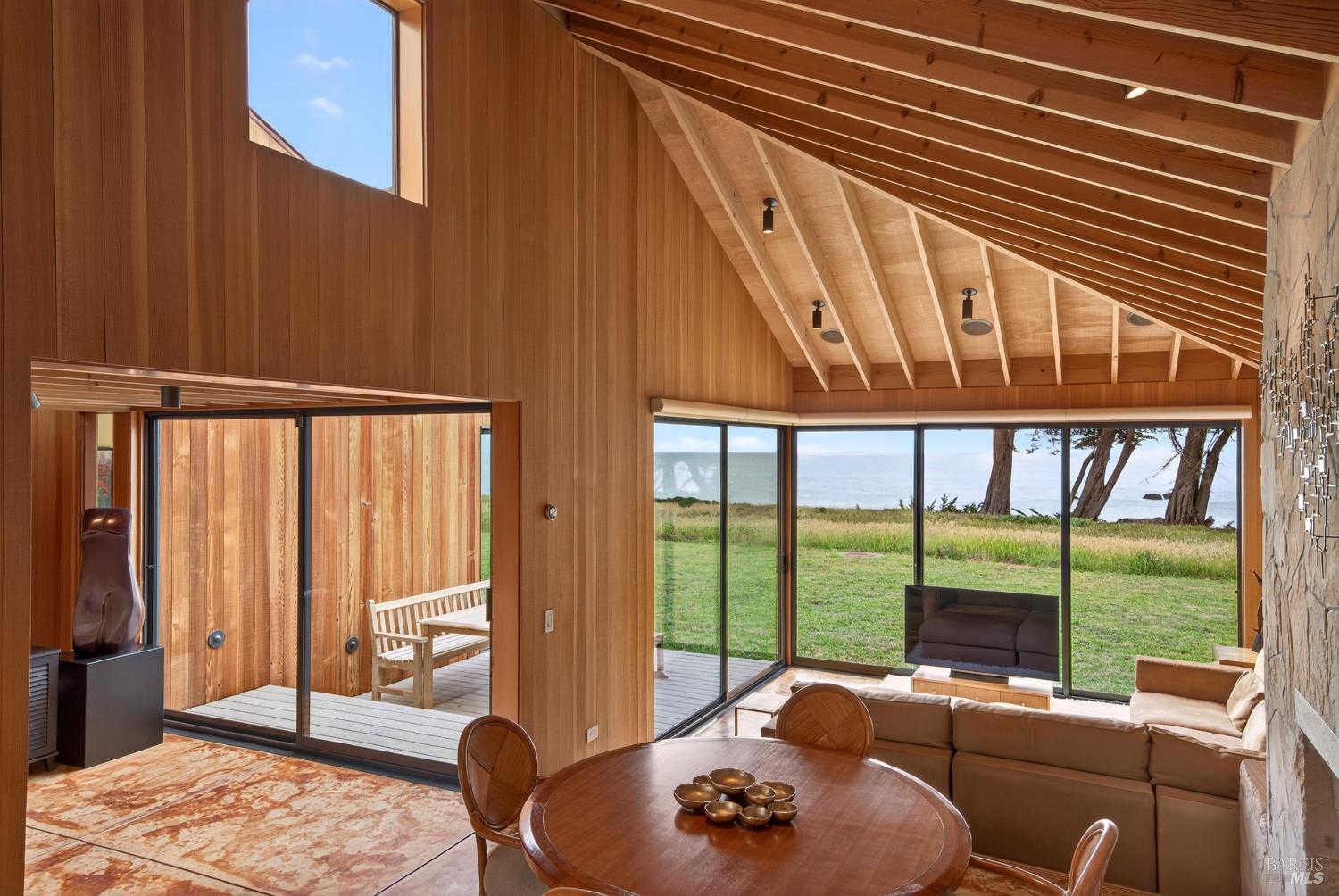 233 Solstice The Sea Ranch, CA 95497 - Photo 6 of 90 Entry showing outdoor deck, living/dining room with ocean view