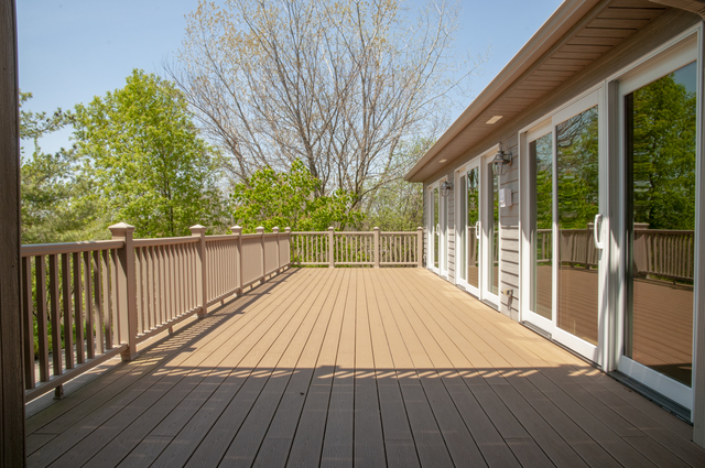201 East Army Trail Road Bartlett, IL 60103 - Photo 14 of 59 a view of outdoor space with wooden floor and yard