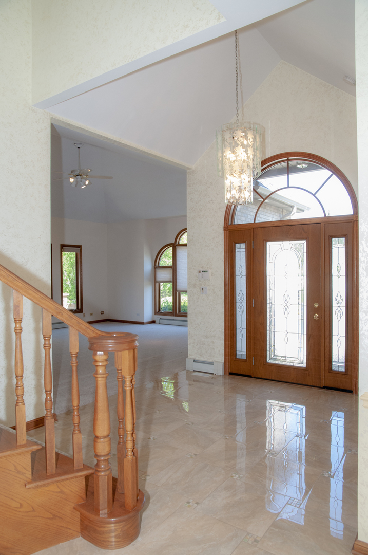 201 East Army Trail Road Bartlett, IL 60103 - Photo 20 of 59 a view of a livingroom with wooden floor and windows