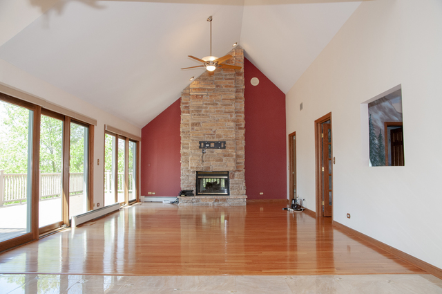 201 East Army Trail Road Bartlett, IL 60103 - Photo 25 of 59 a view of empty room with wooden floor and floor to ceiling window
