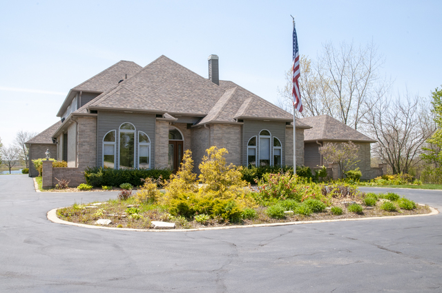 201 East Army Trail Road Bartlett, IL 60103 - Photo 5 of 59 a front view of a house with a yard