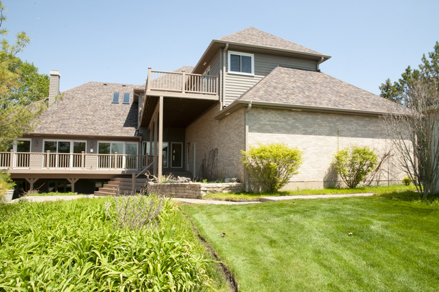 201 East Army Trail Road Bartlett, IL 60103 - Photo 9 of 59 a view of a house with garden and yard