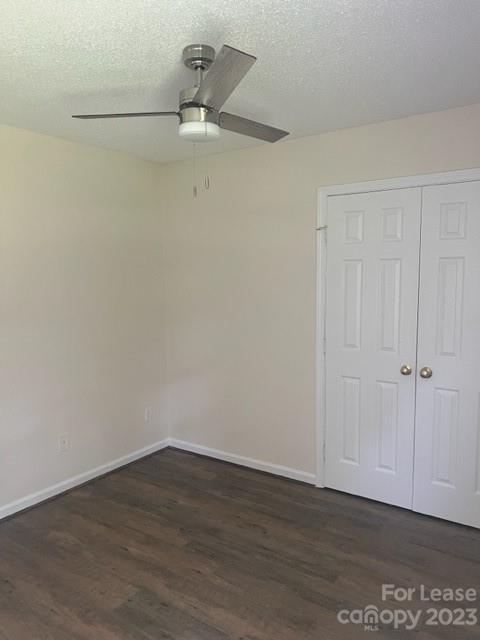 176 Oak Tree Road Mooresville, NC 28117 - Photo 11 of 14 a view of a room with wooden floor