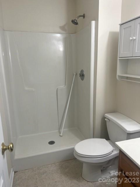 176 Oak Tree Road Mooresville, NC 28117 - Photo 13 of 14 a white toilet sitting next to a bath tub