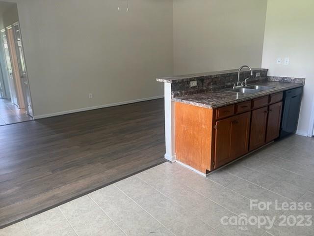 176 Oak Tree Road Mooresville, NC 28117 - Photo 4 of 14 a kitchen with a sink and cabinets