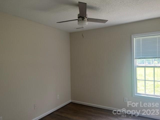 176 Oak Tree Road Mooresville, NC 28117 - Photo 9 of 14 a view of an empty room with a window