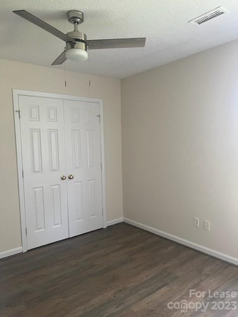 176 Oak Tree Road Mooresville, NC 28117 - Photo 10 of 14 a view of empty room with wooden floor