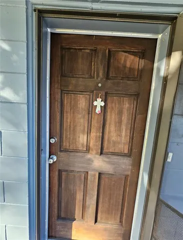 a view of porch with a mirror