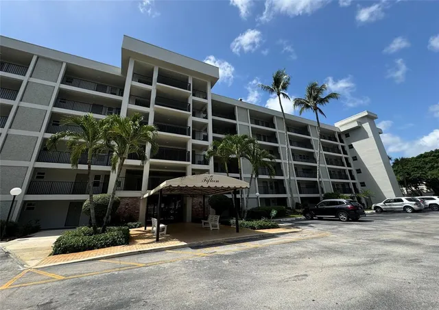 a front view of a building with street view
