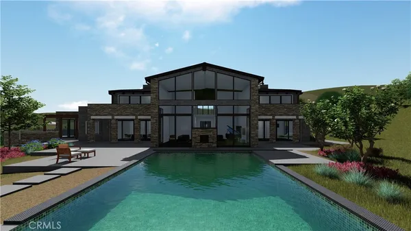 a view of a house with swimming pool and sitting area