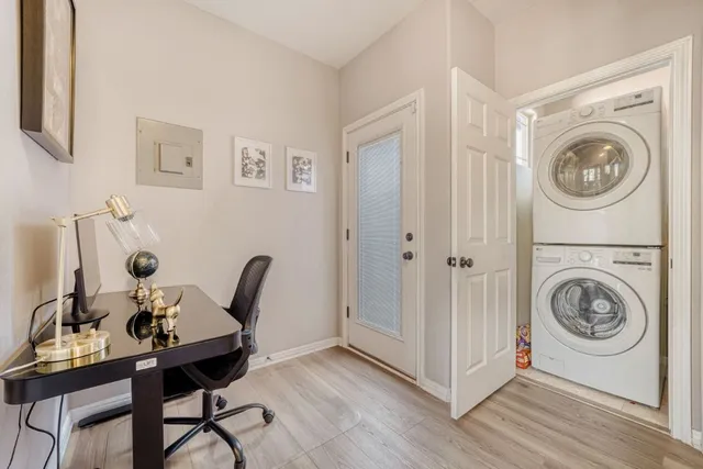 a bedroom with a bed dresser and a window