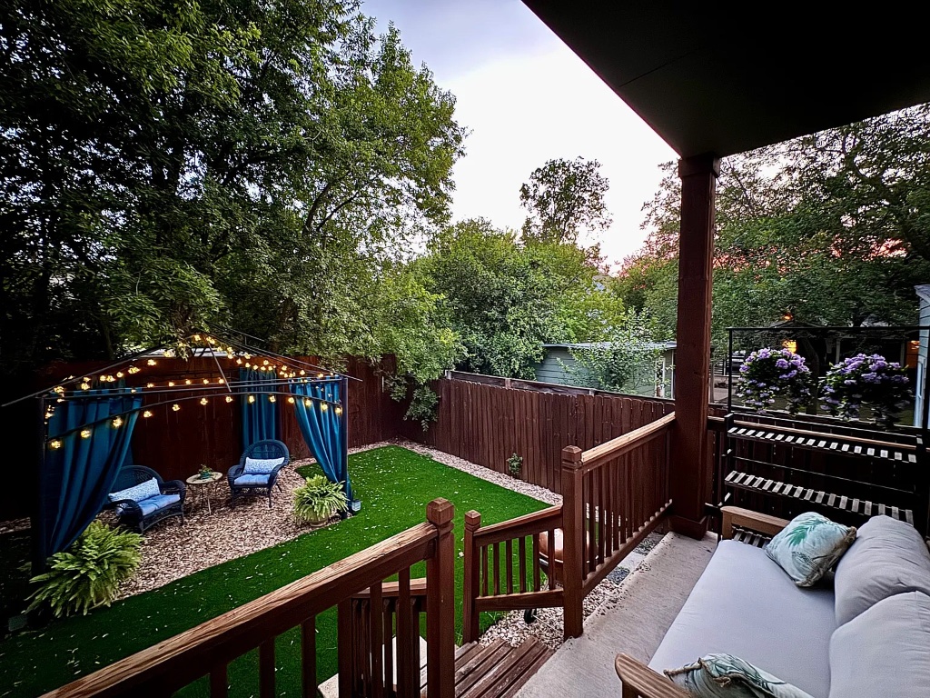 1009 Taulbee Lane, Unit H Austin, TX 78757 - Photo 13 of 17 a view of a roof deck with furniture