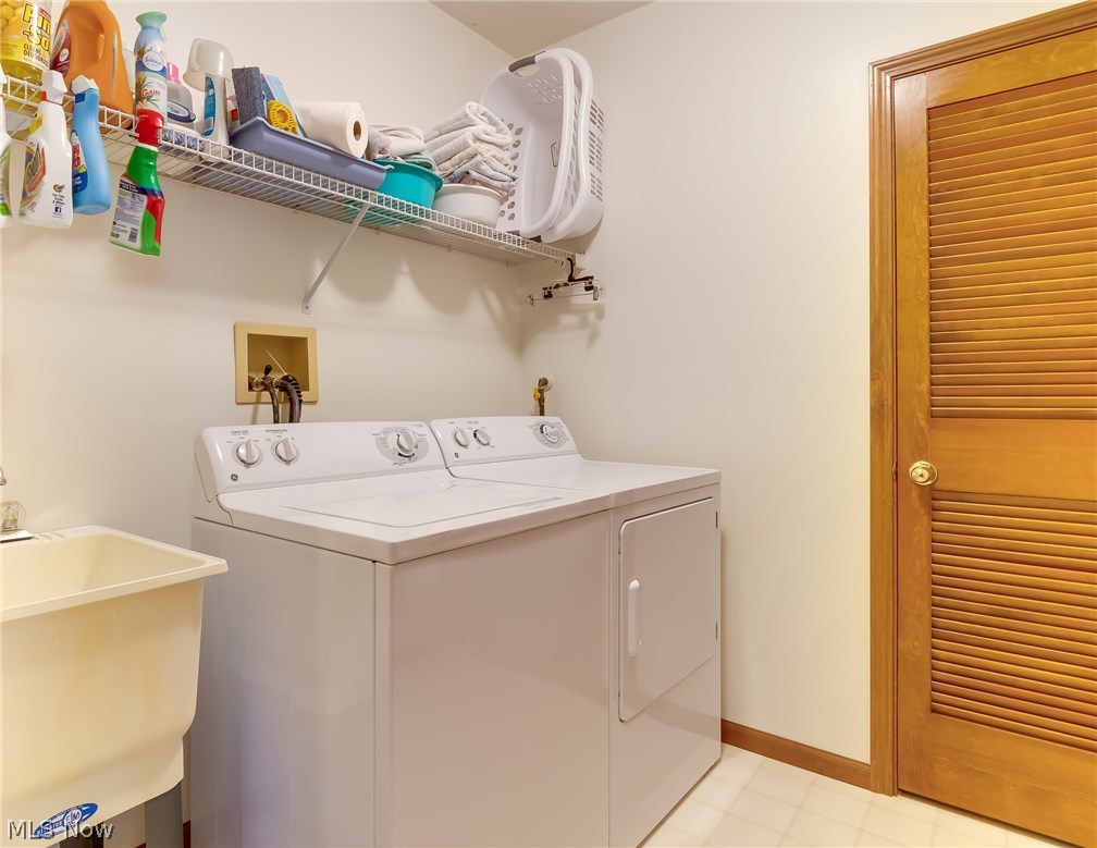 8433 Hendricks Road Mentor, OH 44060 - Photo 25 of 31 Laundry room area features a soaking tub and a separate utility area. The lower level also features another walk in storage room.