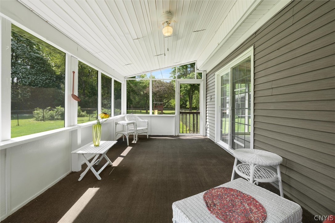 305 Howard Road Volney, NY 13069 - Photo 34 of 49 Off the great room you will find this screened in porch -to rest and relax on.