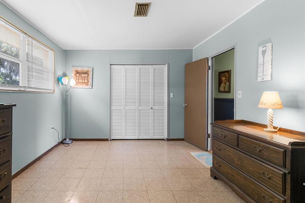 1226 South Telephone Point Road Inverness, FL 34450 - Photo 29 of 43 a view of room with cabinet and lamp