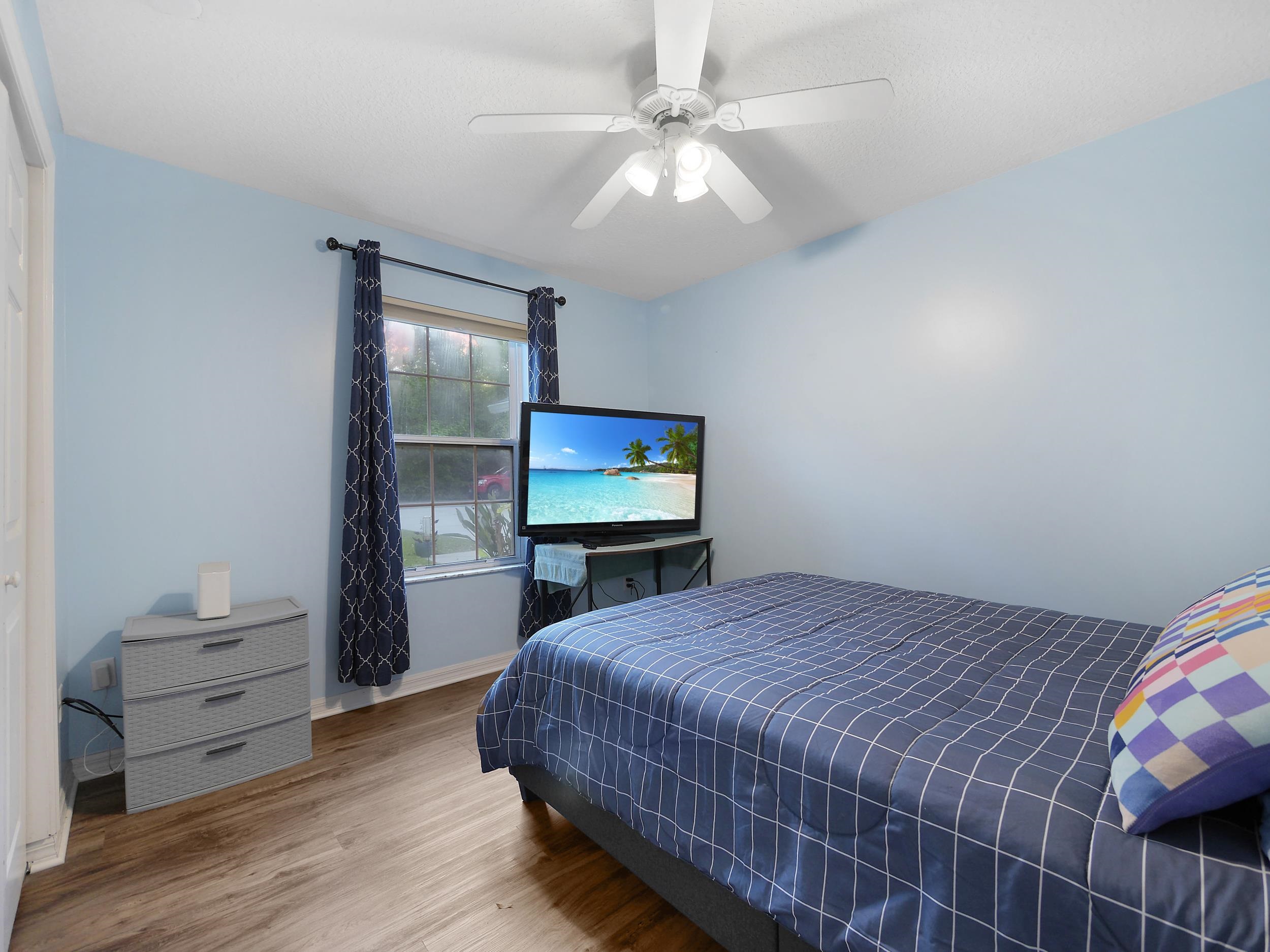 549 Willow Walk Place St. Augustine, FL 32086 - Photo 17 of 32 a bedroom with a bed and a table in it