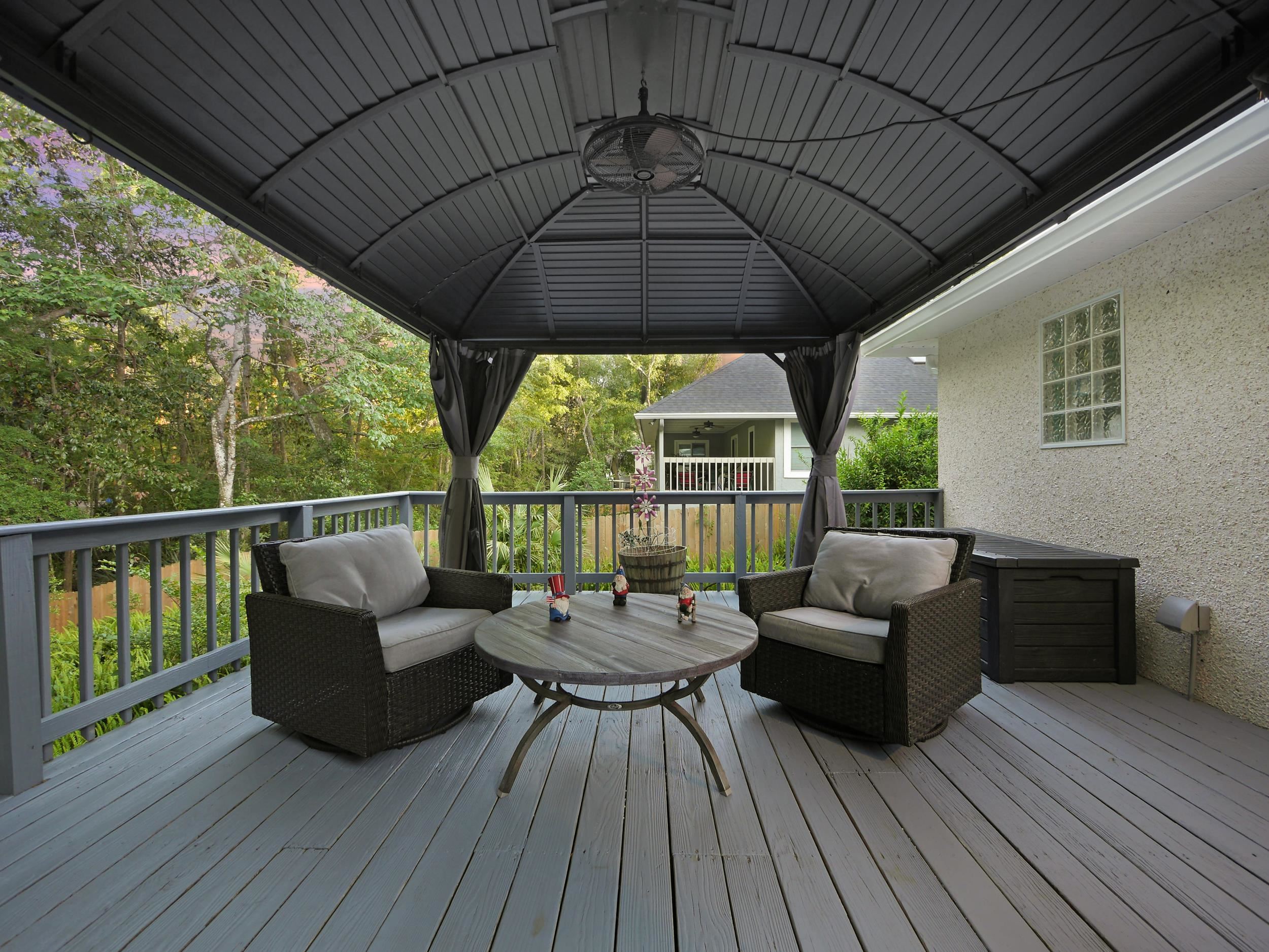 549 Willow Walk Place St. Augustine, FL 32086 - Photo 2 of 32 a balcony with furniture and wooden floor