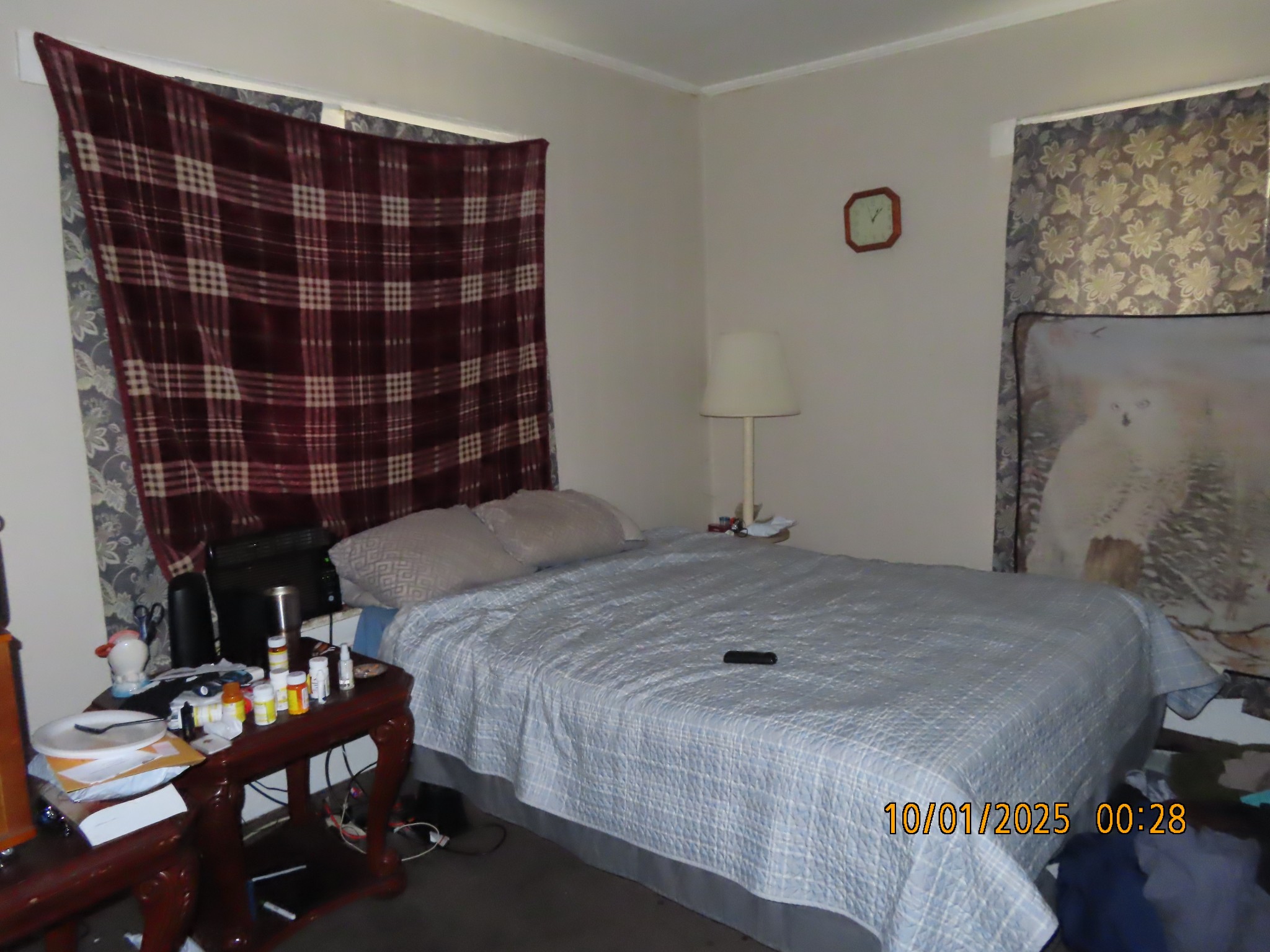 124 Taylor Street Jackson, TN 38301 - Photo 9 of 10 a bedroom with a bed and a painting on the wall