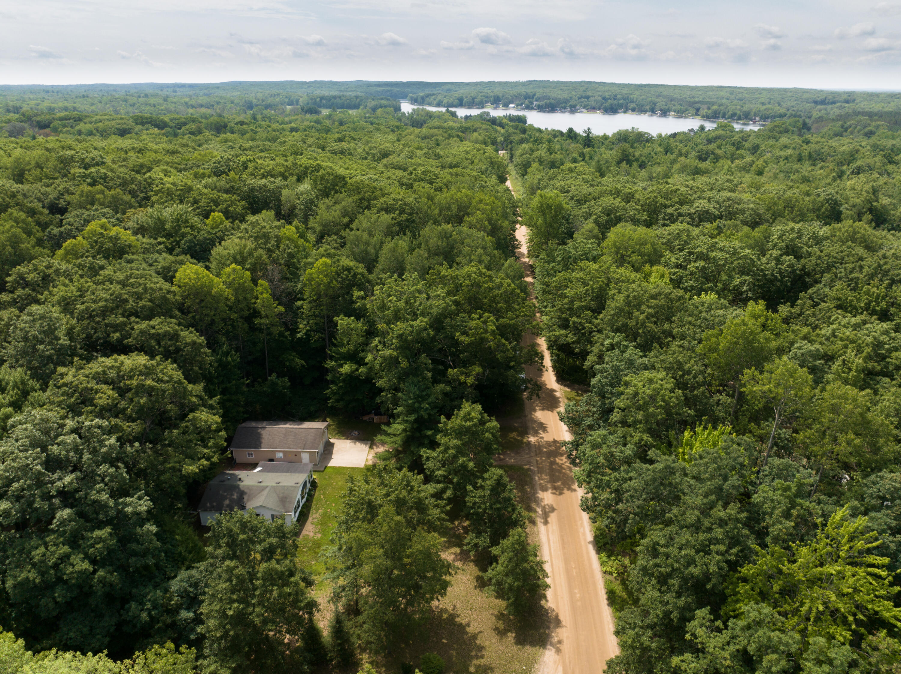 1342 Douglas Road Harrison, MI 48625 - Photo 38 of 38 DJI_20230728123636_0020_D