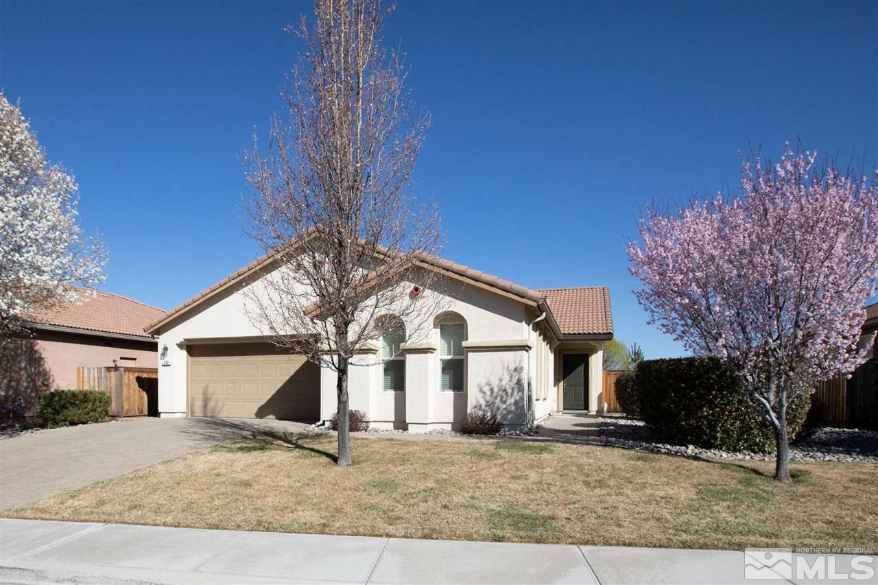 335 Teramo Drive Reno, NV 89521 - Photo 1 of 21 a front view of a house with garden