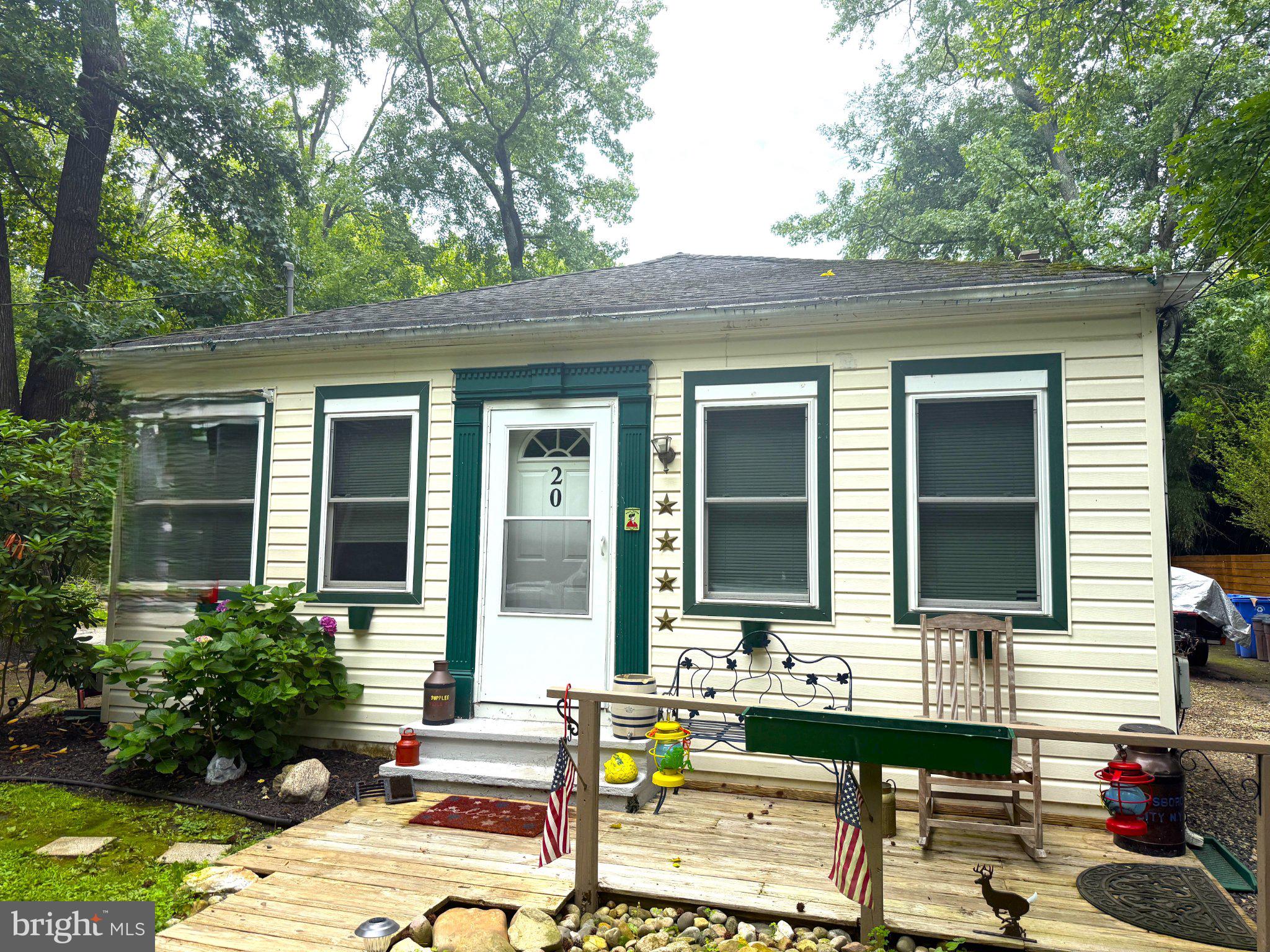 Charming cottage with inviting porch.