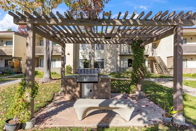 a view of yard with patio