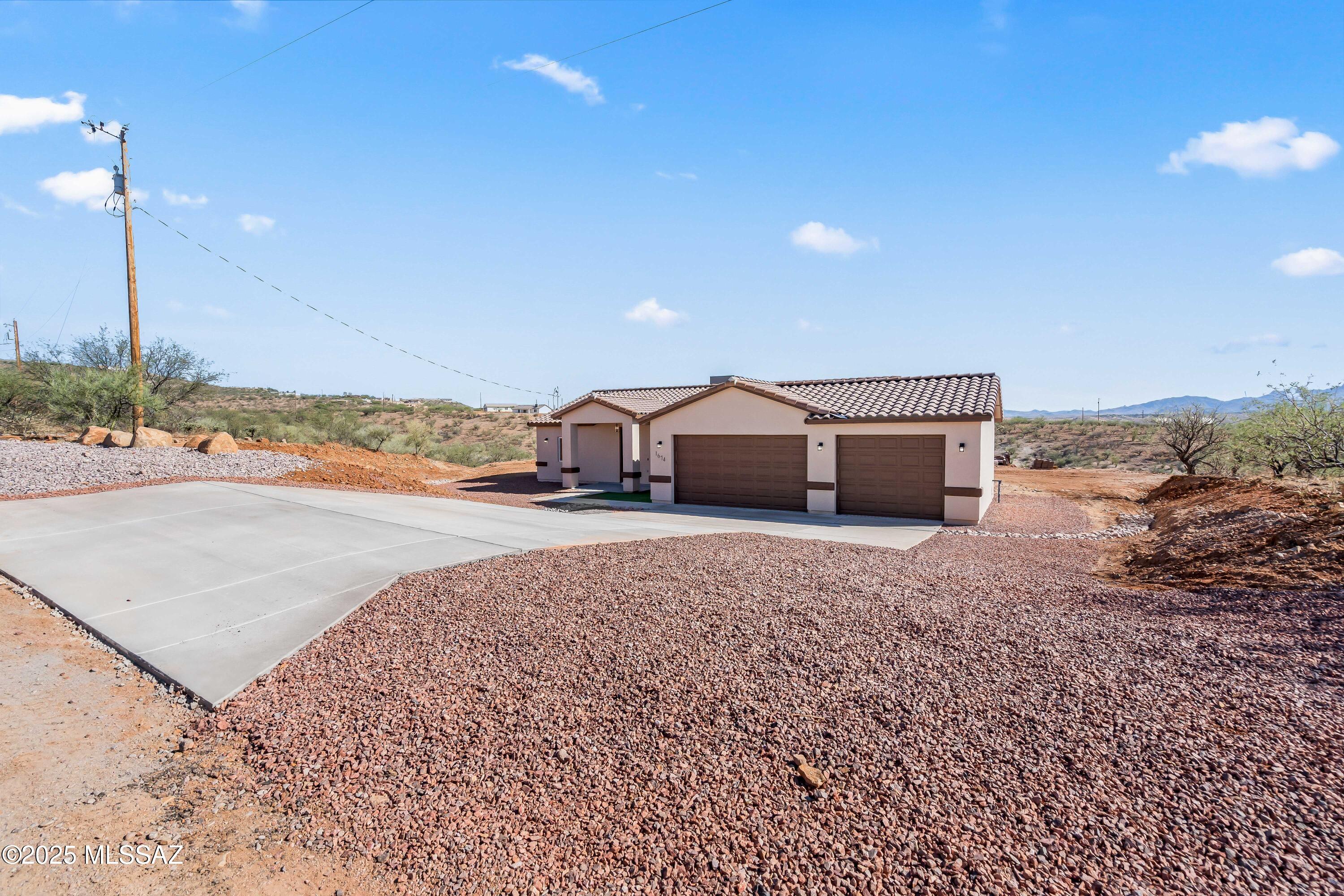 1674 Calle Cabo Rio Rico, AZ 85648 - Photo 2 of 33 a house view with a outdoor space