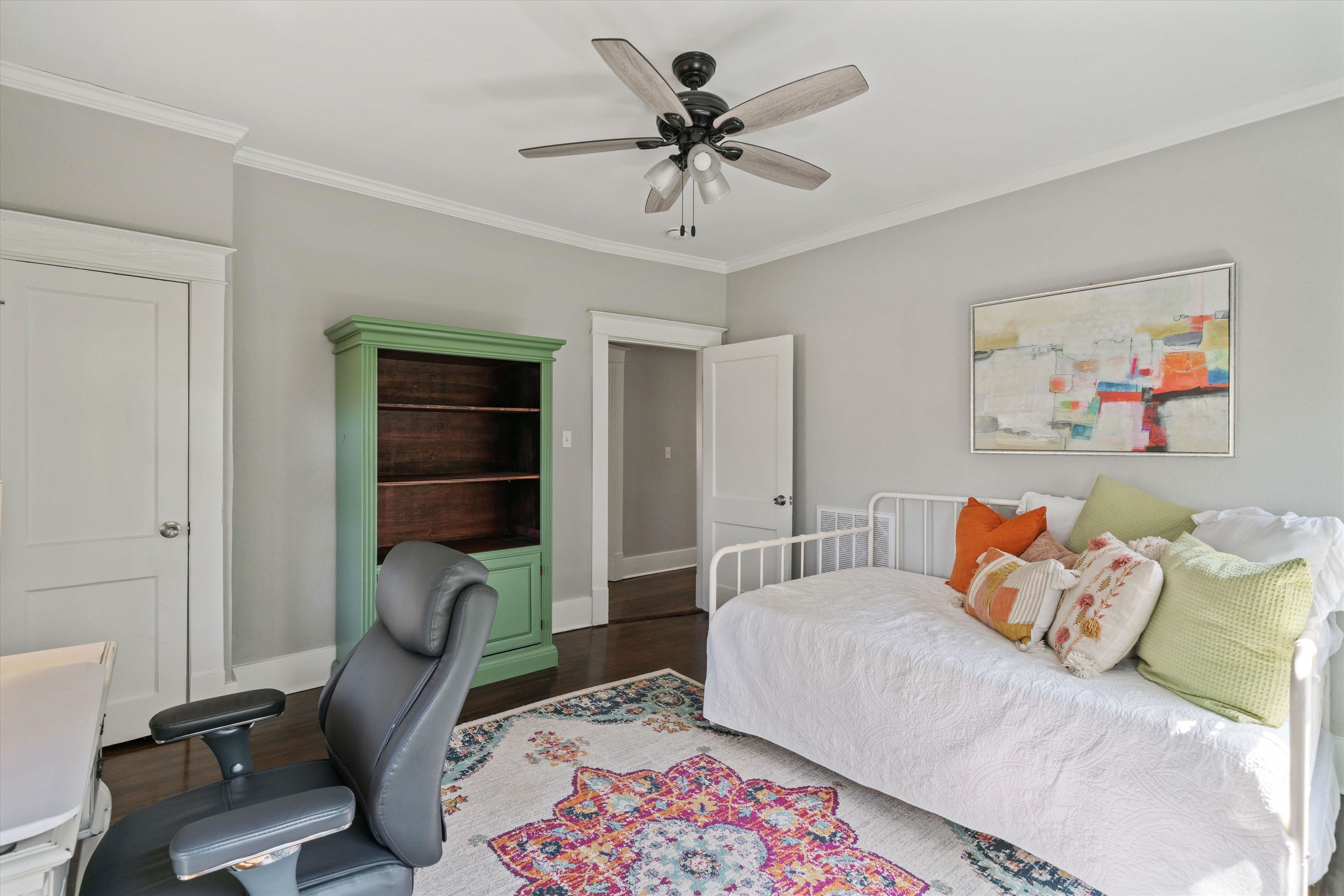 1893 Felix Avenue Memphis, TN 38114 - Photo 16 of 25 a bedroom with a bed and a chandelier