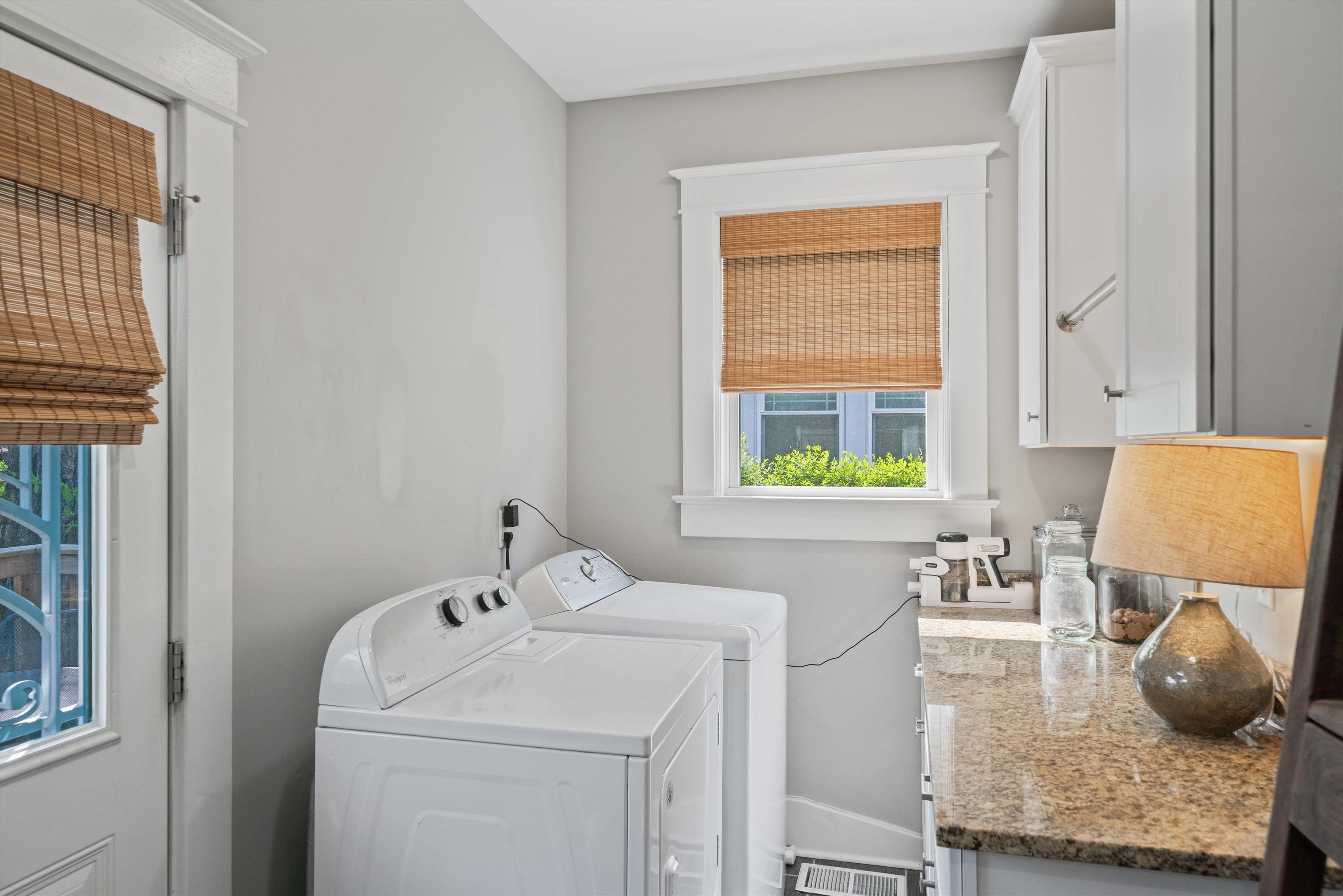 1893 Felix Avenue Memphis, TN 38114 - Photo 20 of 25 a bathroom with a granite countertop sink and a window