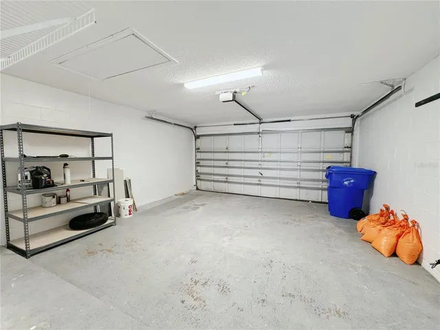 a view of room that has a lot of cabinets