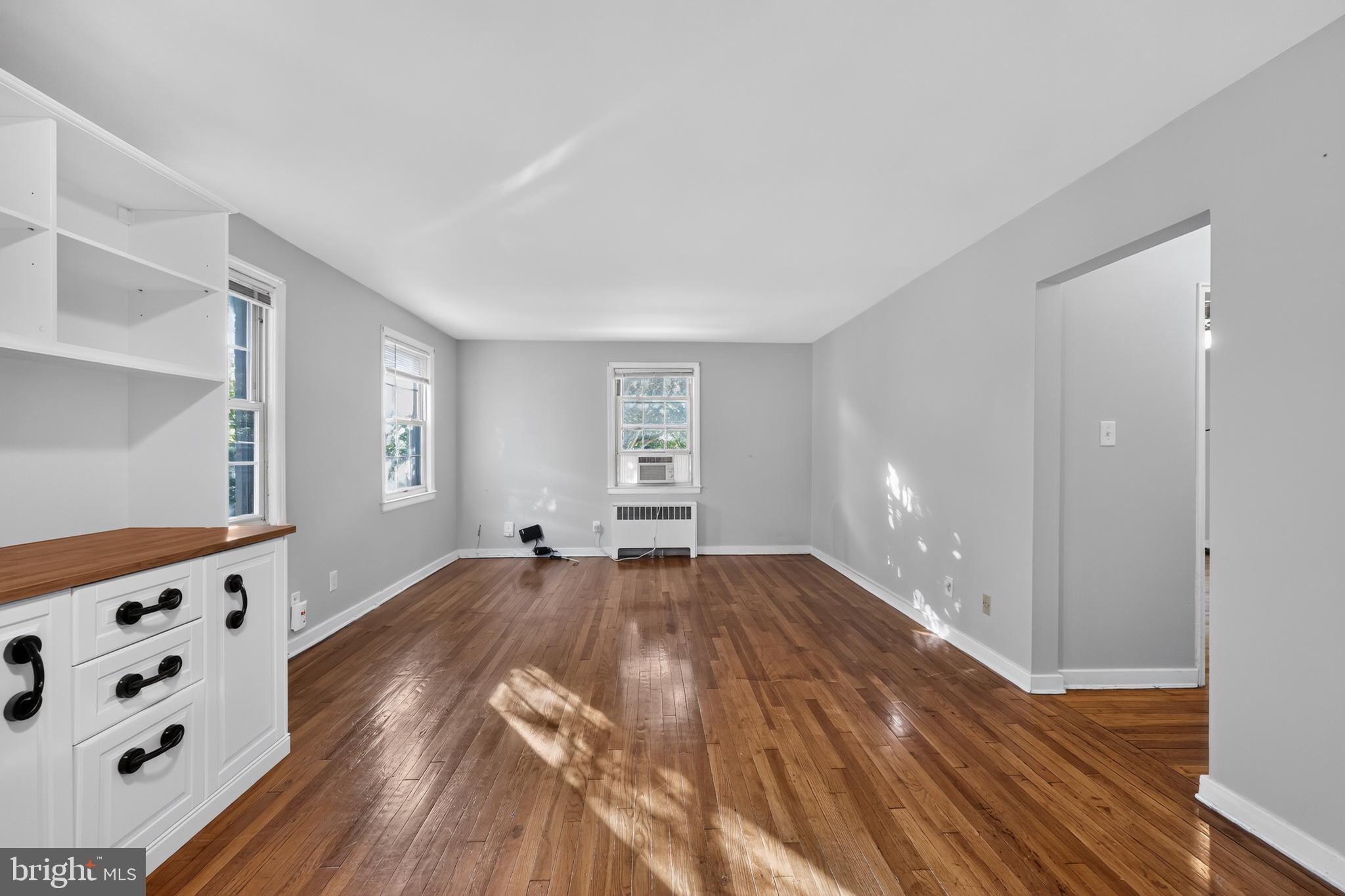 8329 Grubb Road, Unit G103 Silver Spring, MD 20910 - Photo 9 of 24 Bright and airy living space awaits.