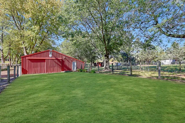 a view of backyard with green space